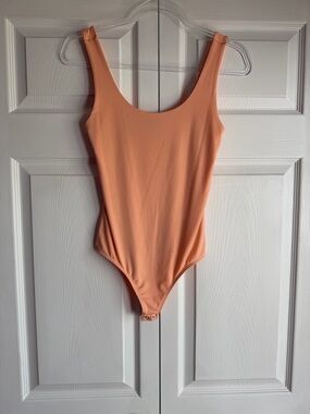 Peach Sleeveless Bodysuit
